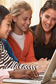 Image of parent working with child